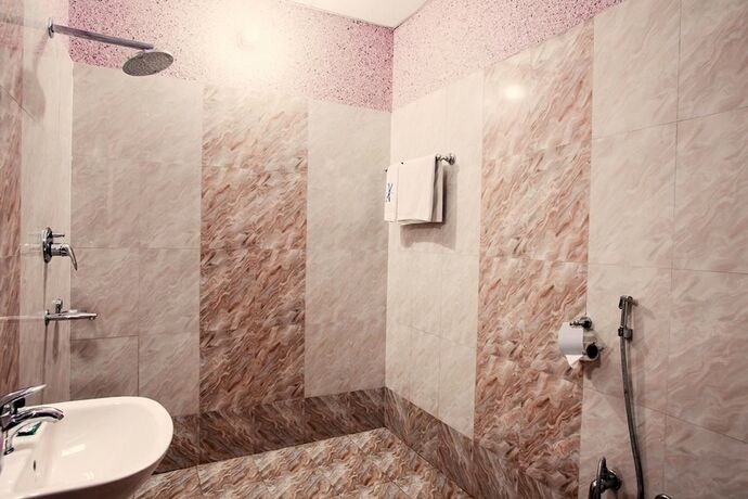 Imagen de la habitación del Hotel Genx Sundaram, Haldwani. Foto 4