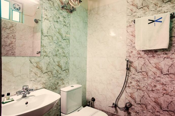 Imagen de la habitación del Hotel Genx Sundaram, Haldwani. Foto 9