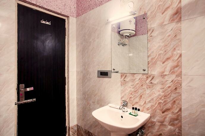 Imagen de la habitación del Hotel Genx Sundaram, Haldwani. Foto 10