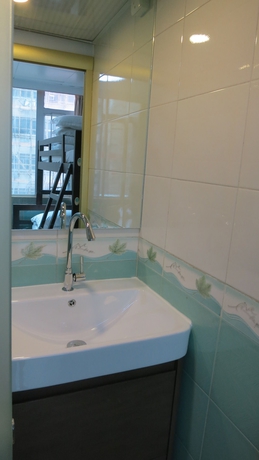 Imagen de la habitación del Hotel Geo Home Holiday. Foto 7