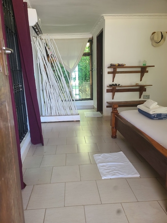 Imagen de la habitación del Hotel Geo Zanzibar Resort. Foto 13