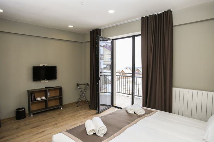 Imagen de la habitación del Hotel GeoGraphy. Foto 12