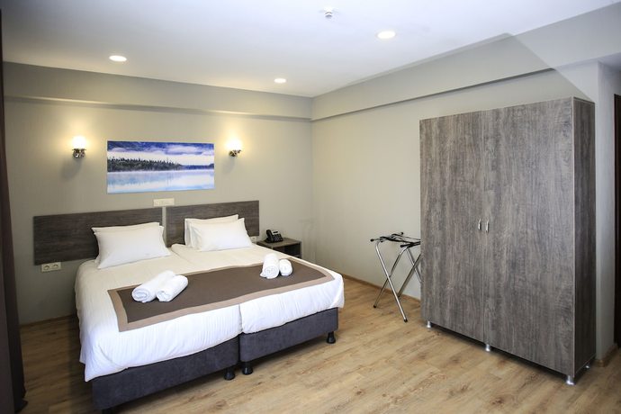 Imagen de la habitación del Hotel GeoGraphy. Foto 14