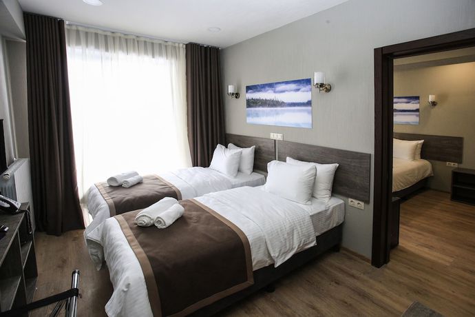 Imagen de la habitación del Hotel GeoGraphy. Foto 15