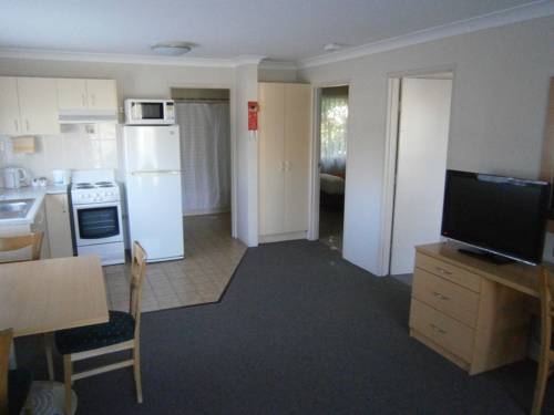 Imagen de la habitación del Hotel George Bass Motor Inn. Foto 1