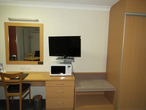 Imagen de la habitación del Hotel George Bass Motor Inn. Foto 2