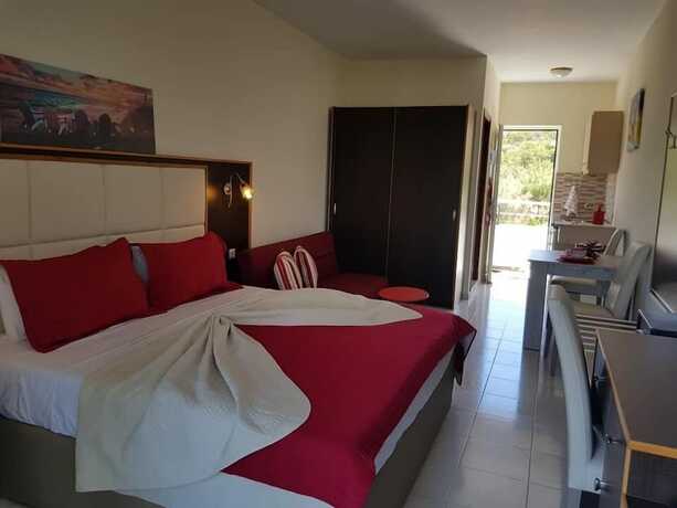 Imagen de la habitación del Hotel George Beach Studios. Foto 24