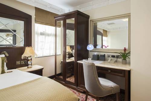 Imagen de la habitación del Hotel George Street. Foto 4