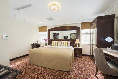 Imagen de la habitación del Hotel George Street. Foto 6