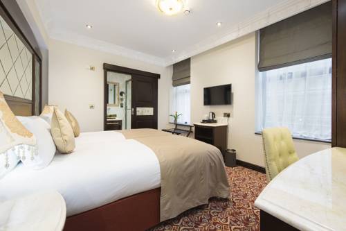 Imagen de la habitación del Hotel George Street. Foto 11