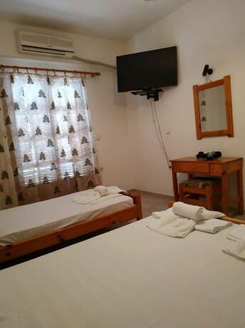 Imagen de la habitación del Hotel George Studios Stalida. Foto 15