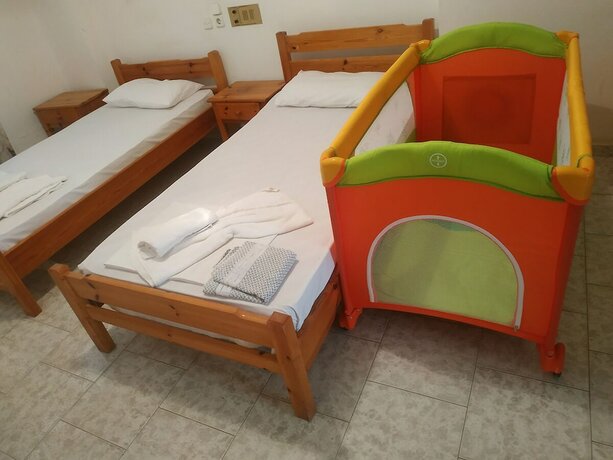 Imagen de la habitación del Hotel George Studios Stalida. Foto 18