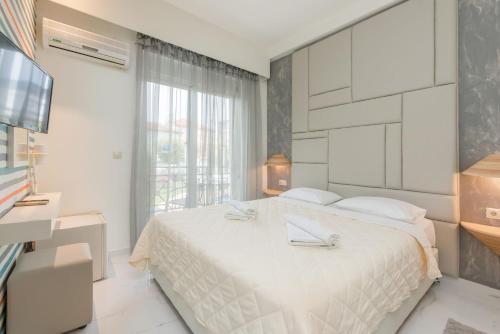 Imagen de la habitación del Hotel George, Tasos. Foto 8