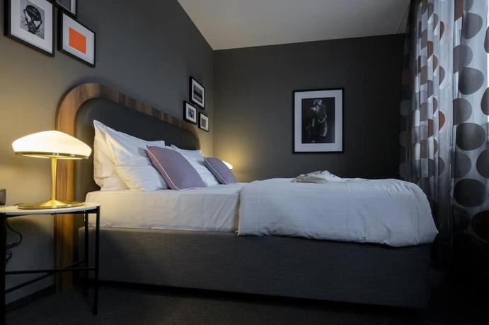 Imagen de la habitación del Hotel George Vienna. Foto 4