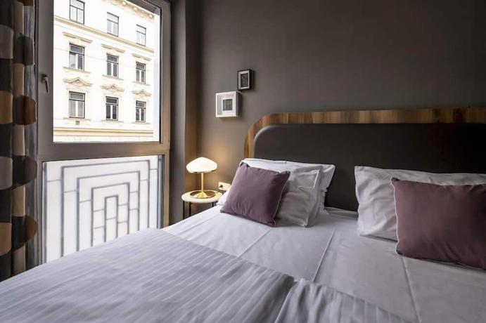 Imagen de la habitación del Hotel George Vienna. Foto 5