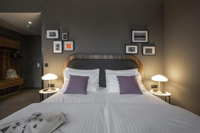 Imagen de la habitación del Hotel George Vienna. Foto 6