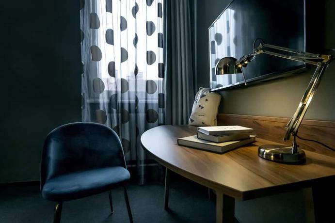 Imagen de la habitación del Hotel George Vienna. Foto 7