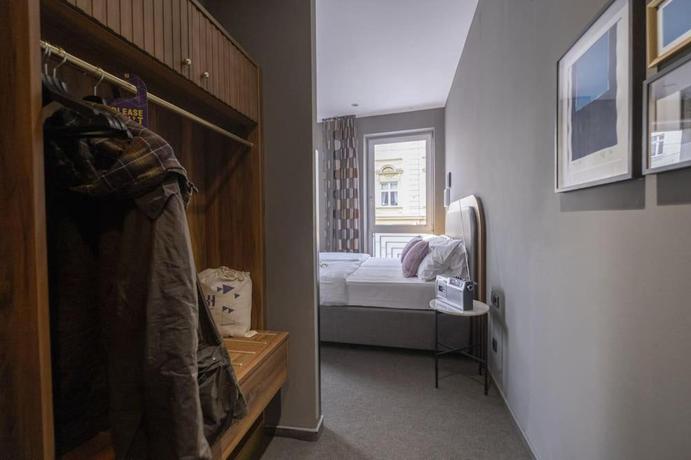 Imagen de la habitación del Hotel George Vienna. Foto 9