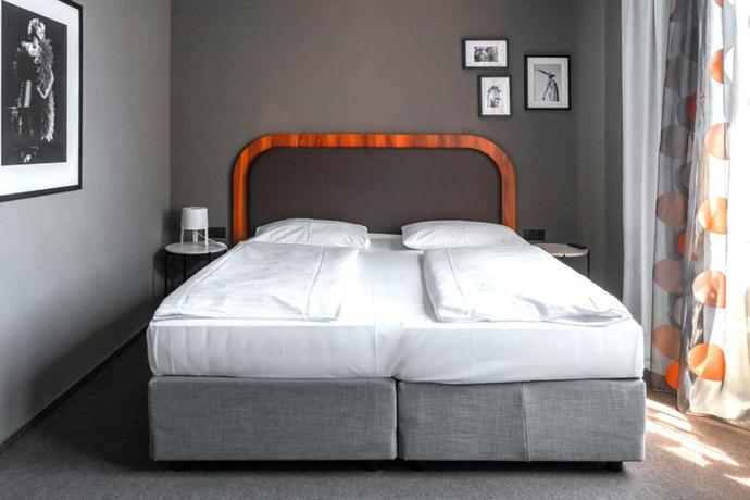 Imagen de la habitación del Hotel George Vienna. Foto 10