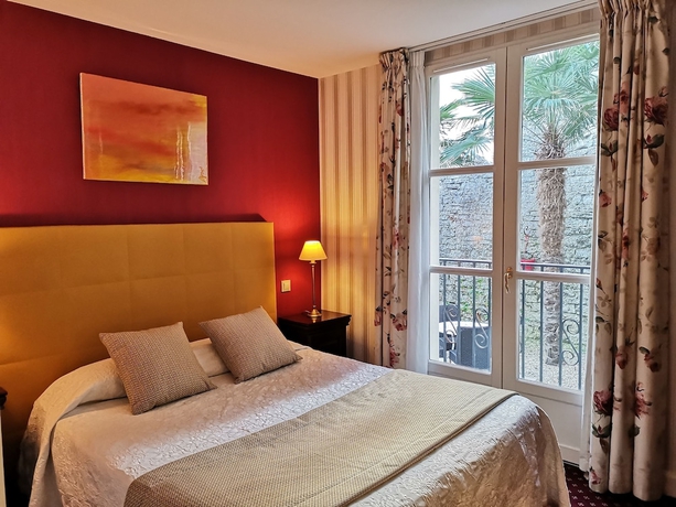 Imagen de la habitación del Hotel Georges Vi. Foto 9