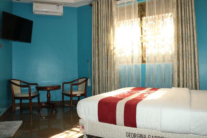 Imagen de la habitación del Hotel Georgina Gardens. Foto 9