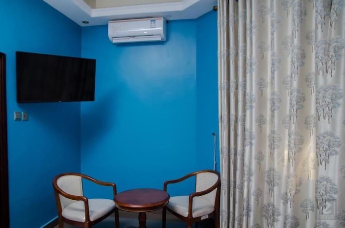 Imagen de la habitación del Hotel Georgina Gardens. Foto 13