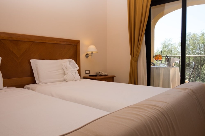 Imagen de la habitación del Hotel Geovillage. Foto 7