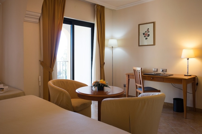 Imagen de la habitación del Hotel Geovillage. Foto 11