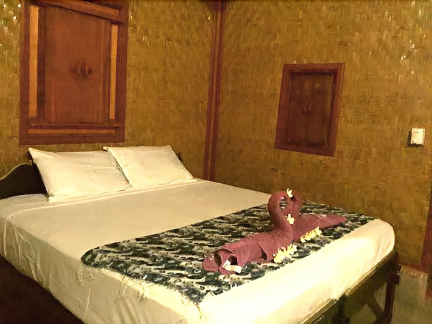 Imagen de la habitación del Hotel Geringsing Bungalow. Foto 17