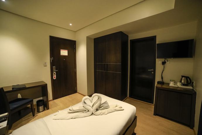 Imagen de la habitación del Hotel German Palace, Ahmedabad. Foto 7