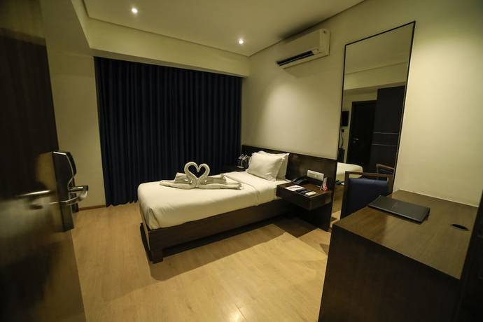 Imagen de la habitación del Hotel German Palace, Ahmedabad. Foto 8