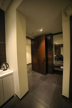 Imagen de la habitación del Hotel German Palace, Ahmedabad. Foto 9