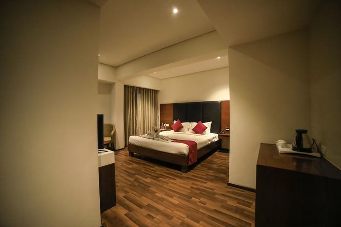 Imagen de la habitación del Hotel German Palace, Ahmedabad. Foto 10