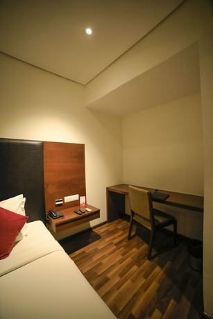 Imagen de la habitación del Hotel German Palace, Ahmedabad. Foto 11