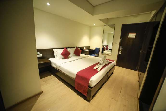 Imagen de la habitación del Hotel German Palace, Ahmedabad. Foto 12