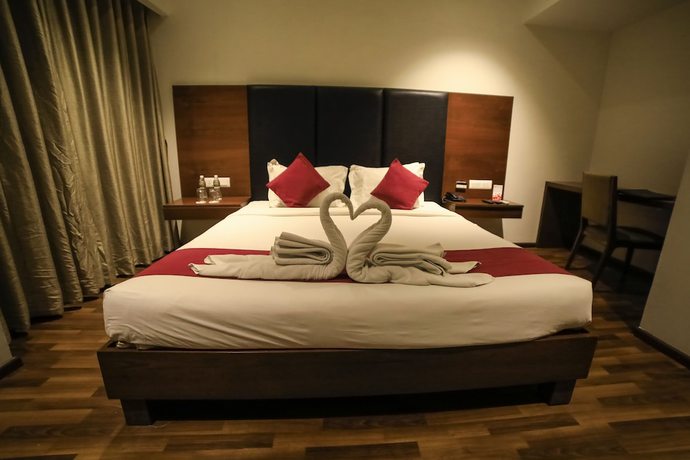 Imagen de la habitación del Hotel German Palace, Ahmedabad. Foto 15