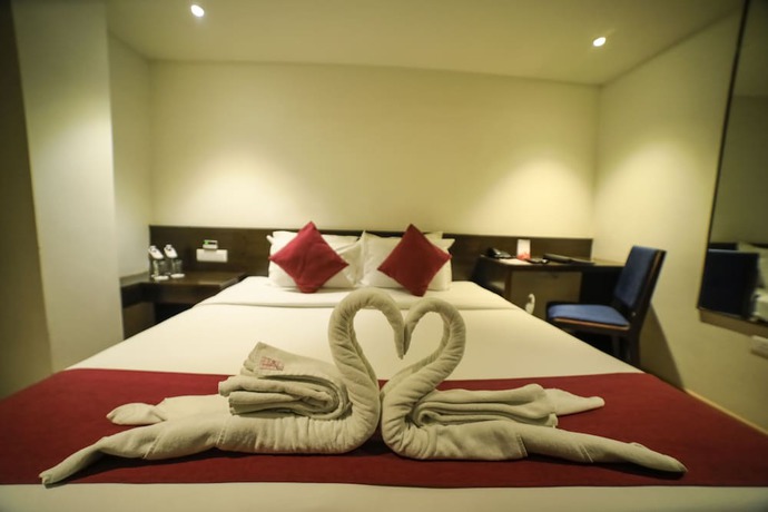 Imagen de la habitación del Hotel German Palace, Ahmedabad. Foto 16