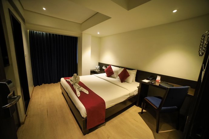 Imagen de la habitación del Hotel German Palace, Ahmedabad. Foto 17