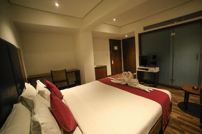 Imagen de la habitación del Hotel German Palace, Ahmedabad. Foto 18