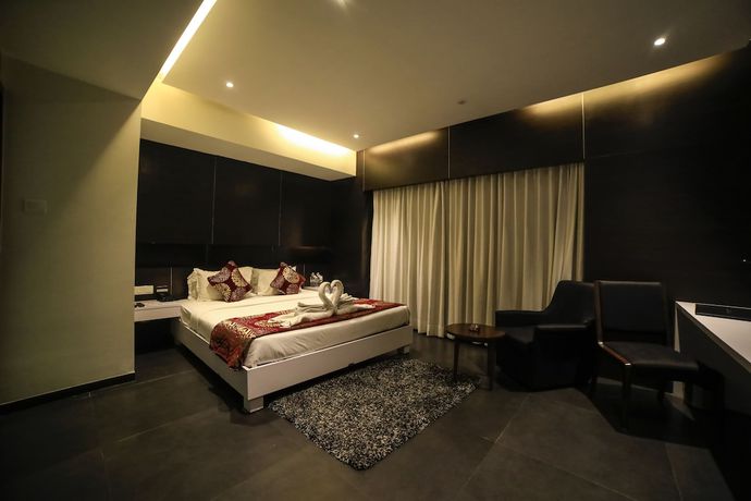 Imagen de la habitación del Hotel German Palace, Ahmedabad. Foto 19