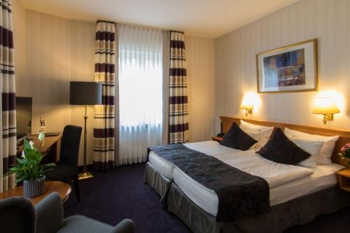 Imagen de la habitación del Hotel Germania, Cochem. Foto 8