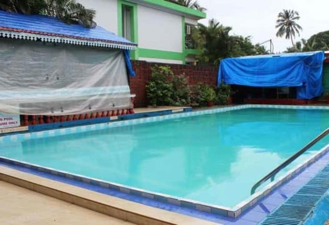 Imagen de la piscina del Hotel Germany Goa. Foto 13