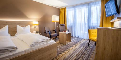 Imagen de la habitación del Hotel Gesundheitshotel Wei&szlig;enstadt am See. Foto 7
