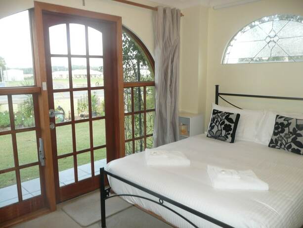 Imagen de la habitación del Hotel Getaway Inn Boutique Guest House. Foto 11