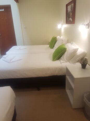 Imagen de la habitación del Hotel Getaway Inn Boutique Guest House. Foto 16