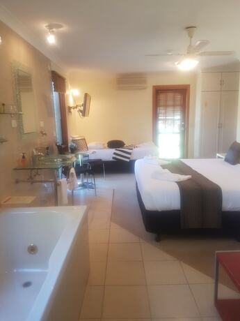 Imagen de la habitación del Hotel Getaway Inn Boutique Guest House. Foto 19