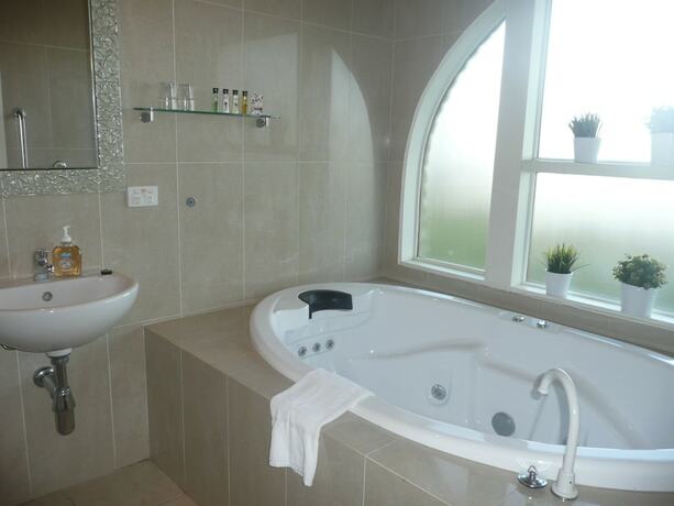 Imagen de la habitación del Hotel Getaway Inn Boutique Guest House. Foto 22