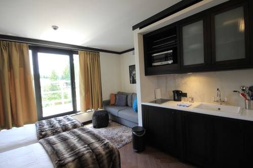 Imagen de la habitación del Hotel Getaway Studios Brussels Airport. Foto 2