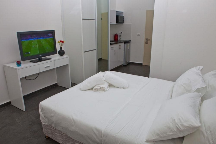 Imagen de la habitación del Hotel Geula Suites. Foto 5