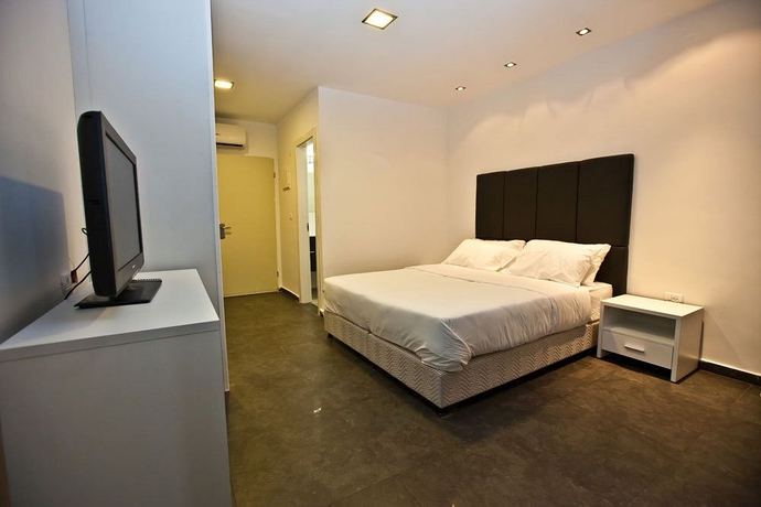 Imagen de la habitación del Hotel Geula Suites. Foto 8